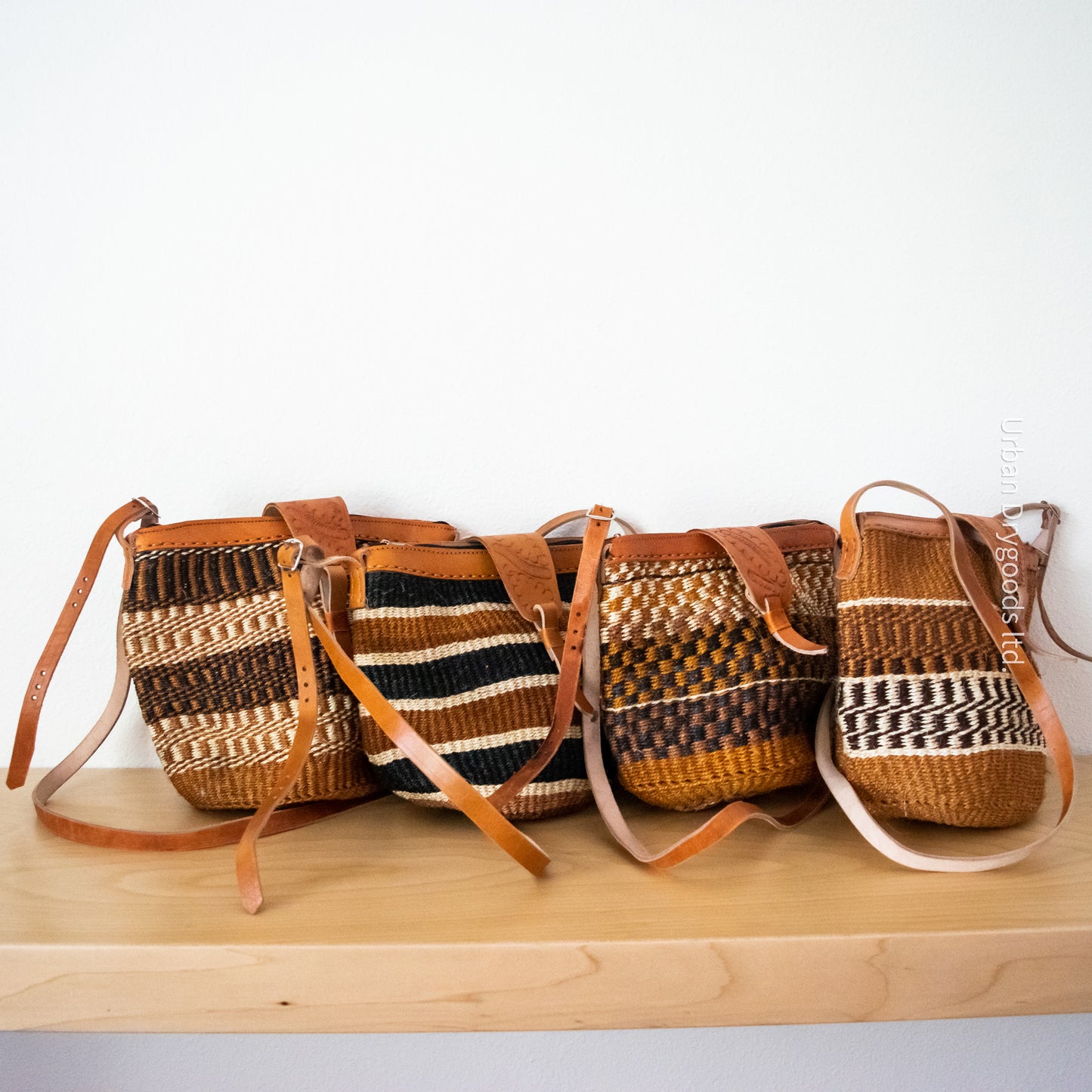 Sisal and Leather African Cross-Body Sling Bag, with Black, Brown, and Cream-Colored Stripes