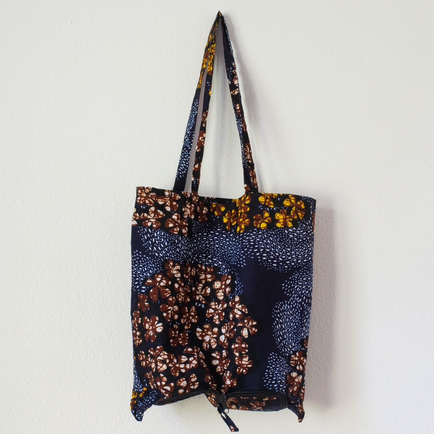 Handmade African Folding Tote Bag with a Navy Blue and Brown Pattern