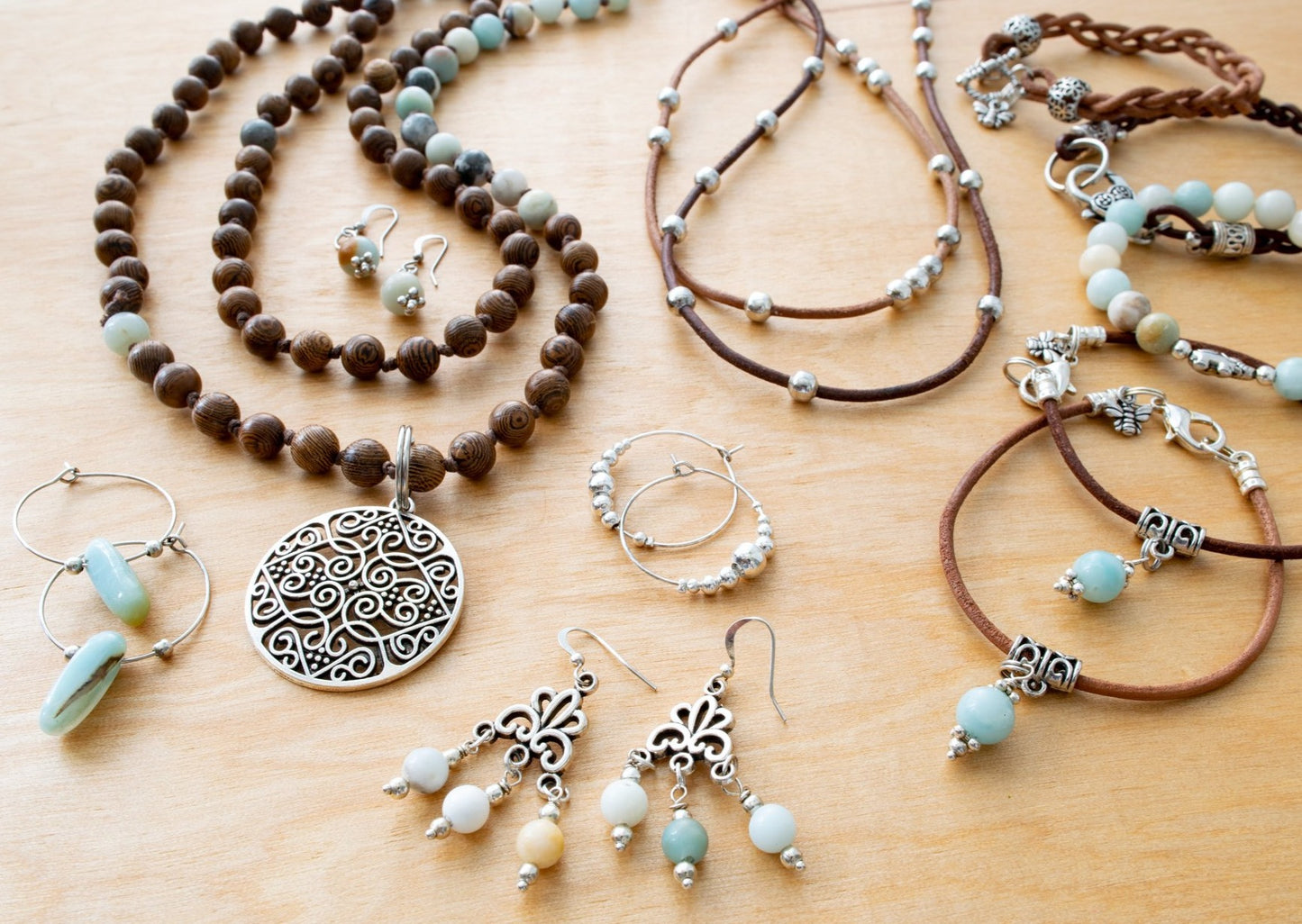 Beginnings, Dark Brown Braided Leather Bracelet with a Lotus Heart Clasp