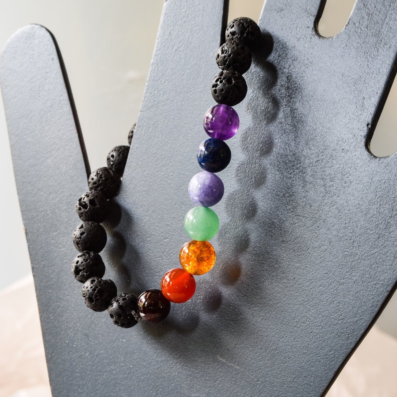 Zariah Colors black lava bracket with a rainbow of semiprecious stone