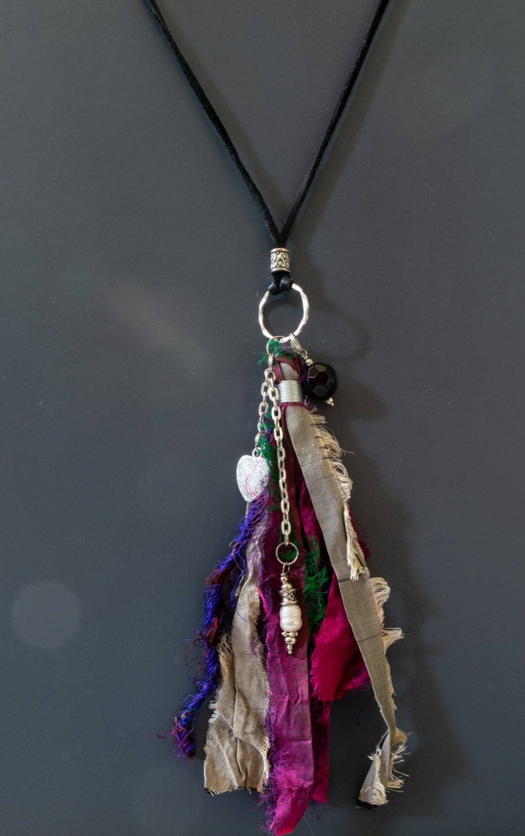 Silk Road, Adjustable Leather Necklace with a Purple Silk Tassel, Silver Heart and Pearl