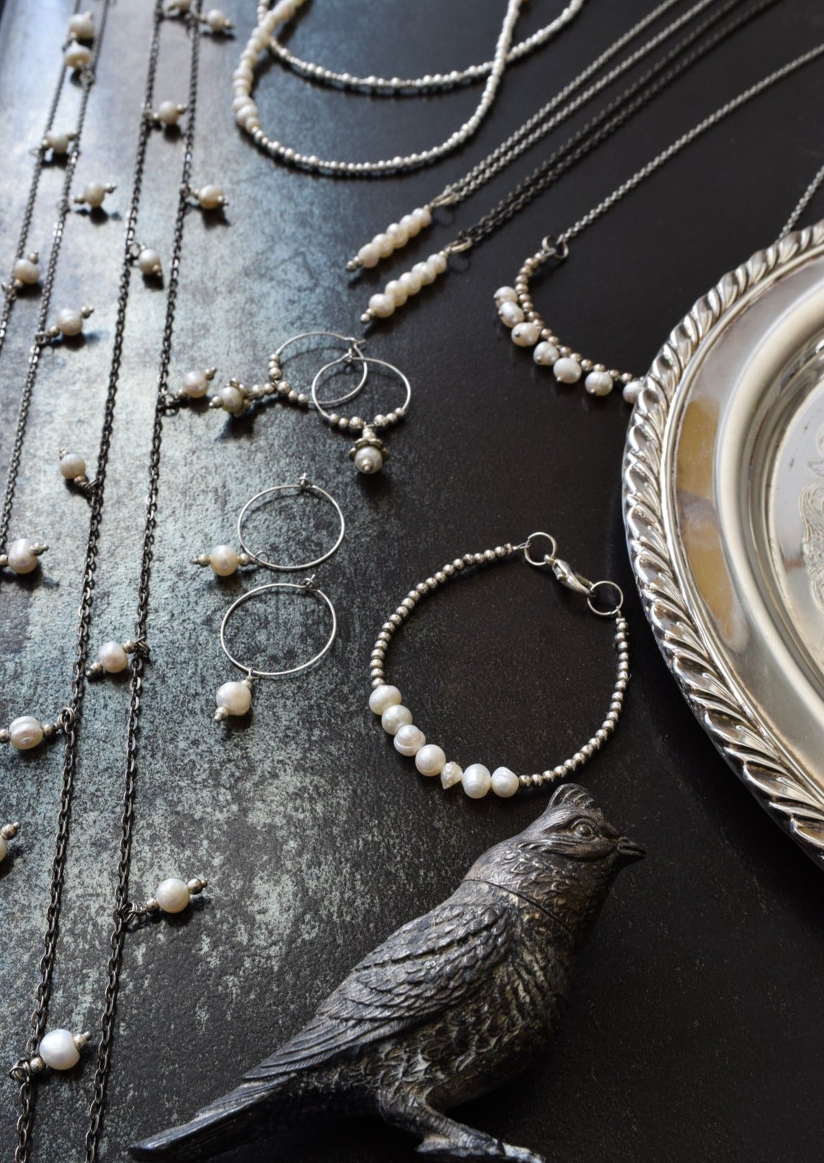 Expressions in pearls collection pearl necklaces ,earrings, and bracelet found in modern vintage collection