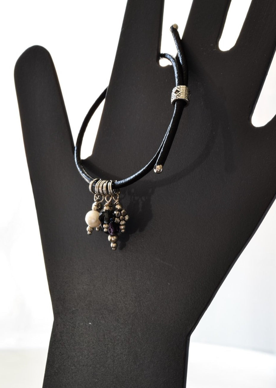 Expressions In Jewels, Adjustable Black Leather Bracelet, with Assorted Crystals and a Fresh Water Pearl