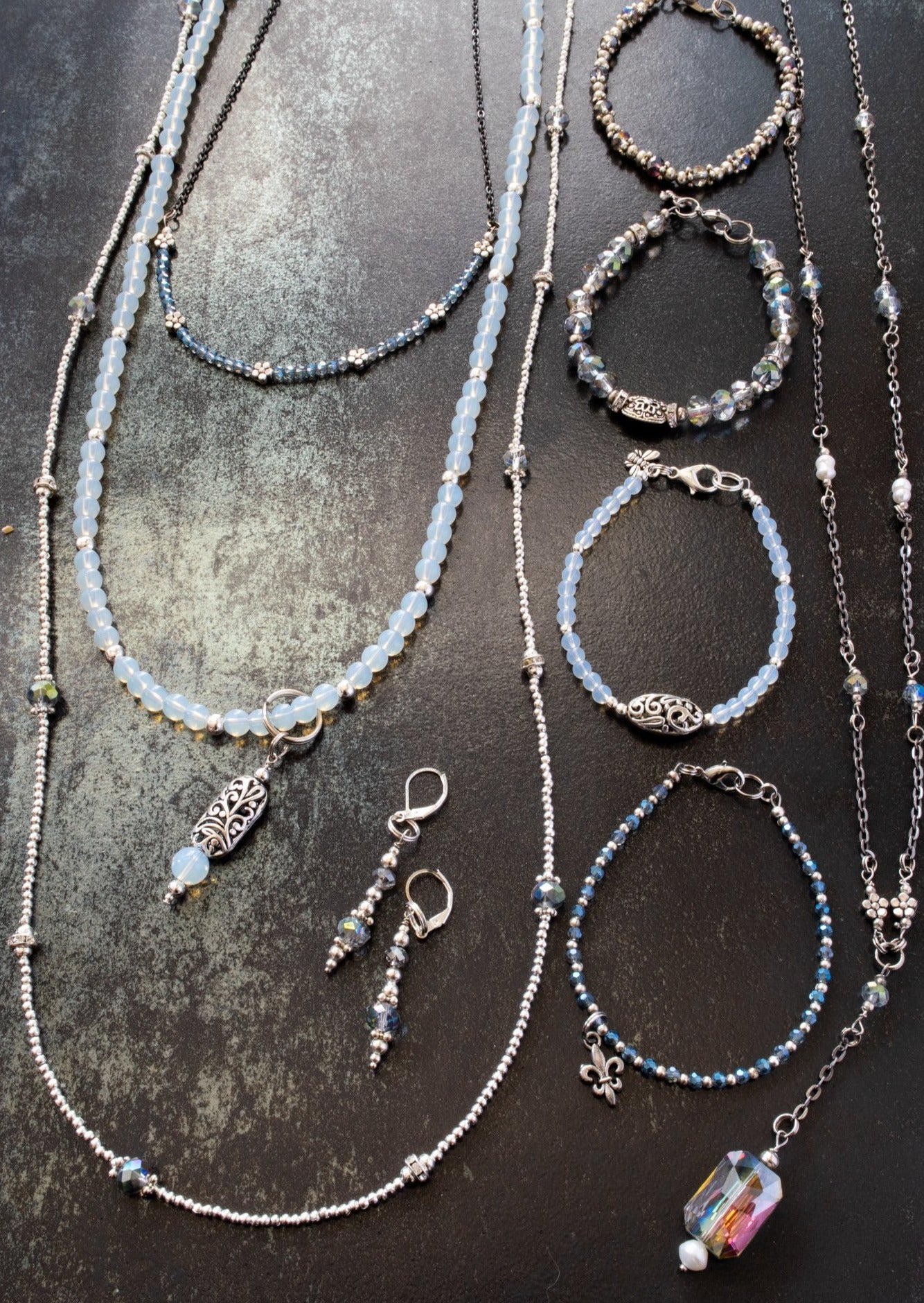 Expressions in Blue, Bracelet with Electro-Plated Crystals, Silver beads, and an Antiqued Silver Flower