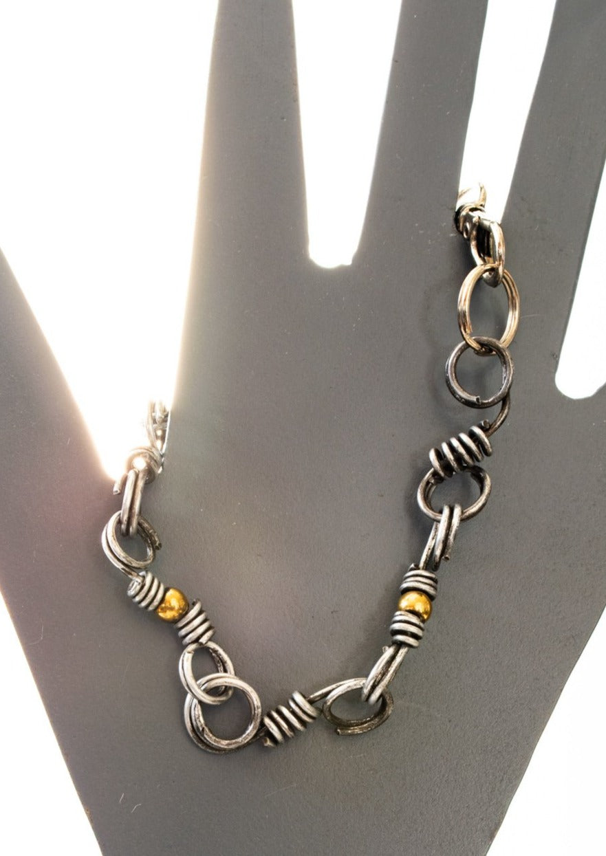 Marty's Twisted, Bracelets with Gold Plated Hematite Beads and Steel Links