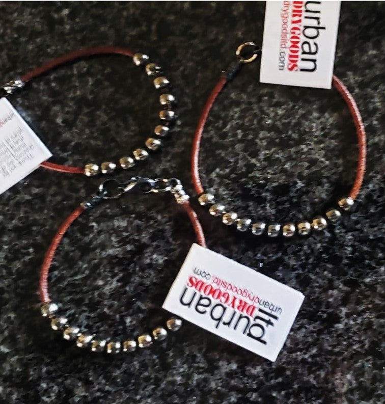 Beginnings ,Single Natural Darkt Brown Bracelet with silver beads