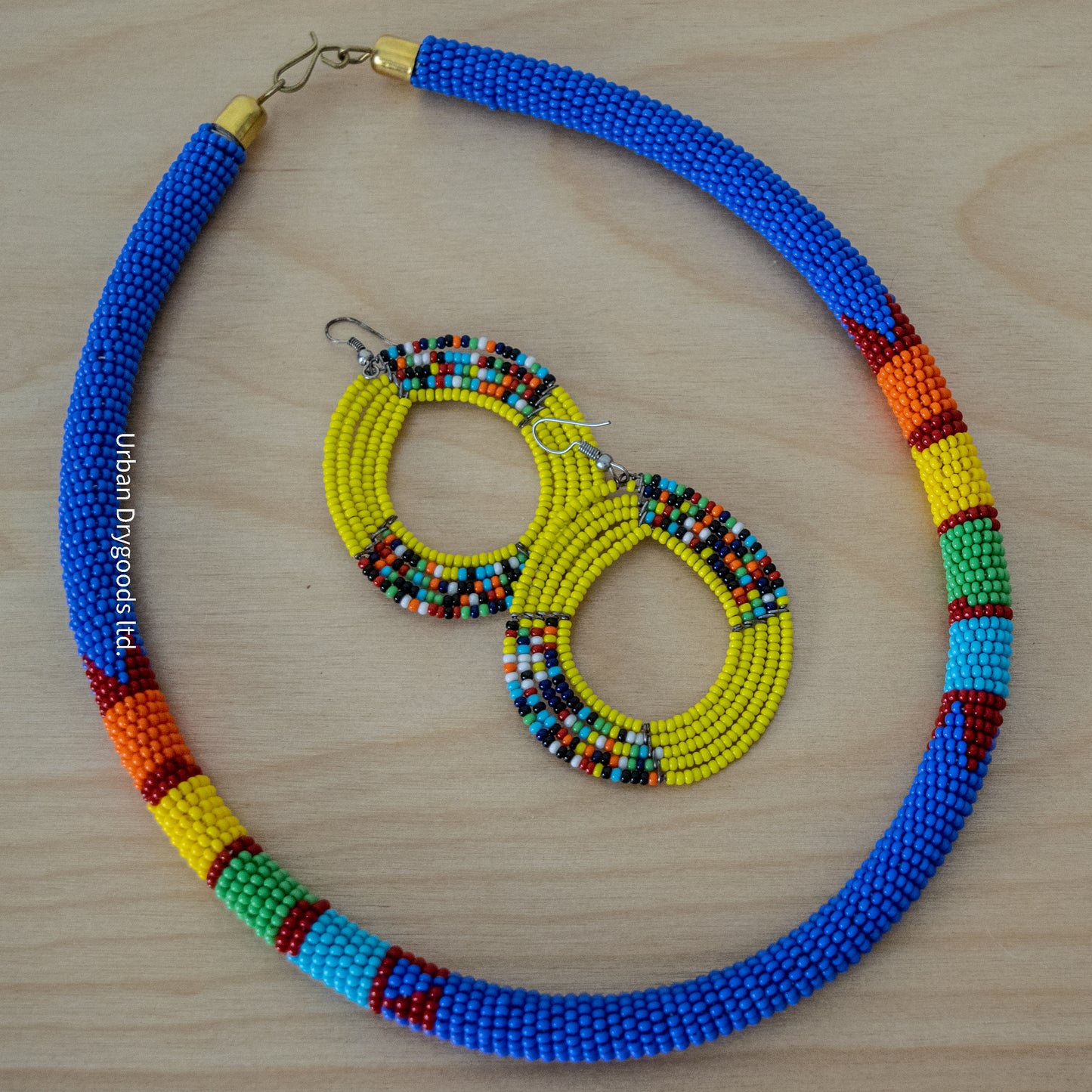 Zulu and Messiah African Handmade Beaded Necklace Periwinkle with Red, Orange, Yellow, Green, and Sky Blue