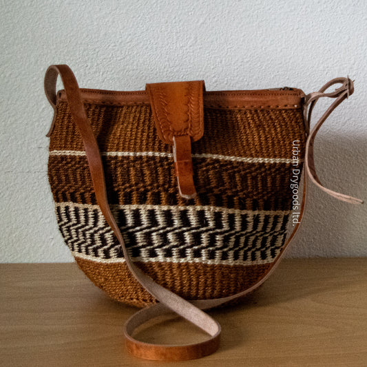 Sisal and Leather African Cross-Body Sling Bag, with Brown, Rust, Black, and Cream Colored Stripes in a  Zigzag Pattern