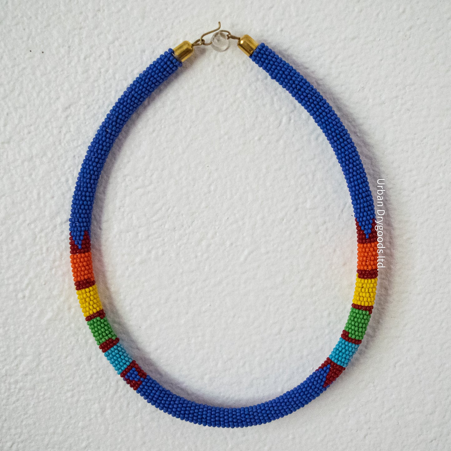 Zulu and Messiah African Handmade Beaded Necklace Periwinkle with Red, Orange, Yellow, Green, and Sky Blue