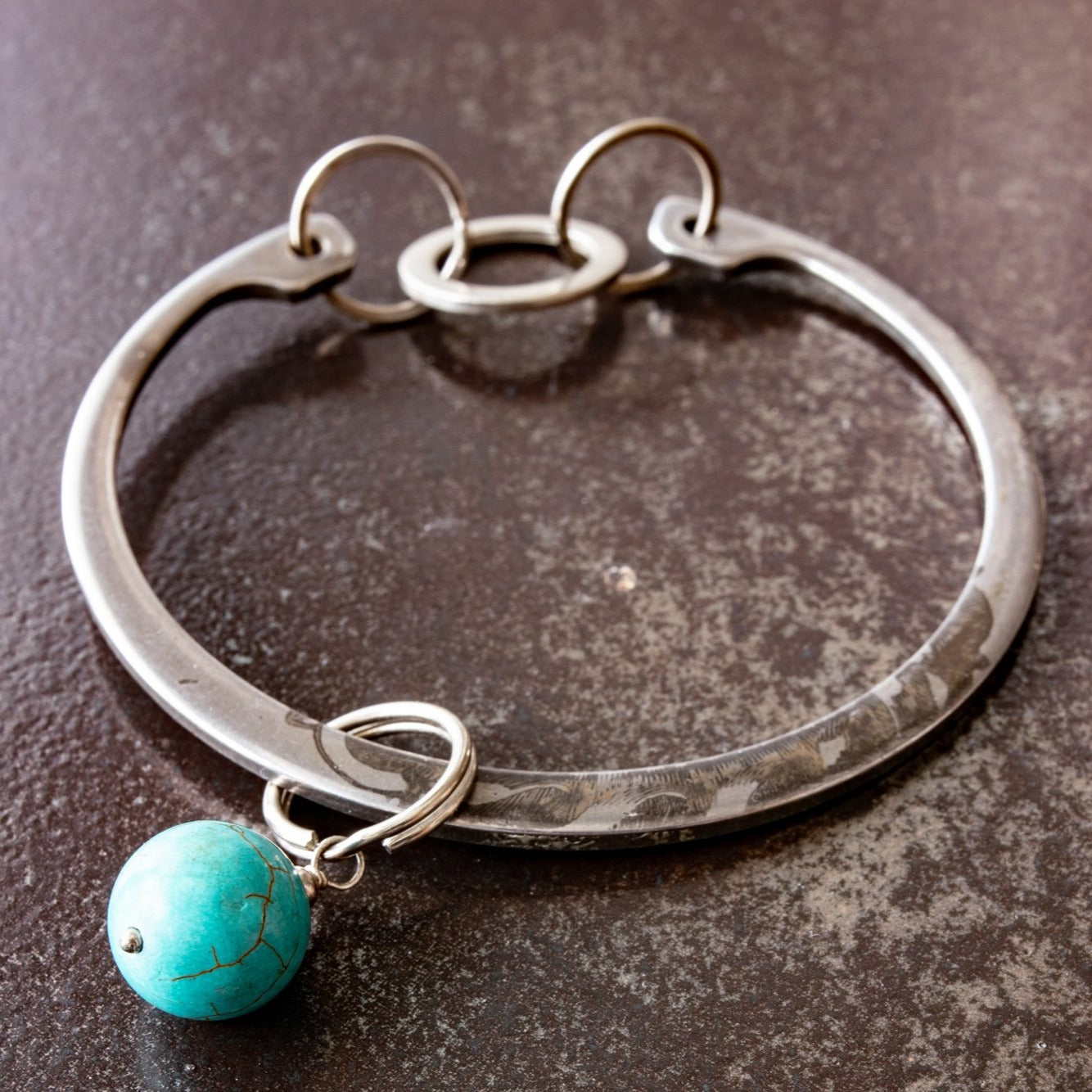 Impressions, Steel Bracelet with a Turquoise Bangle