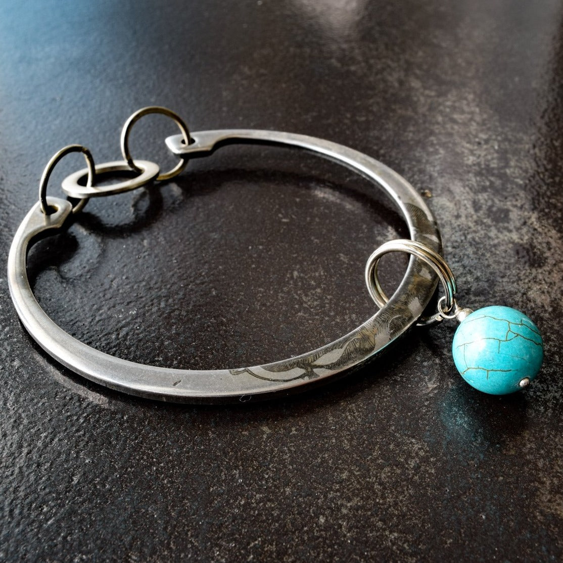 Impressions, Steel Bracelet with a Turquoise Bangle