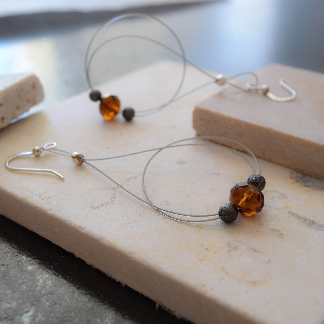 Basics, Loop-de-Loop Dangle Earrings with an Amber Crystal