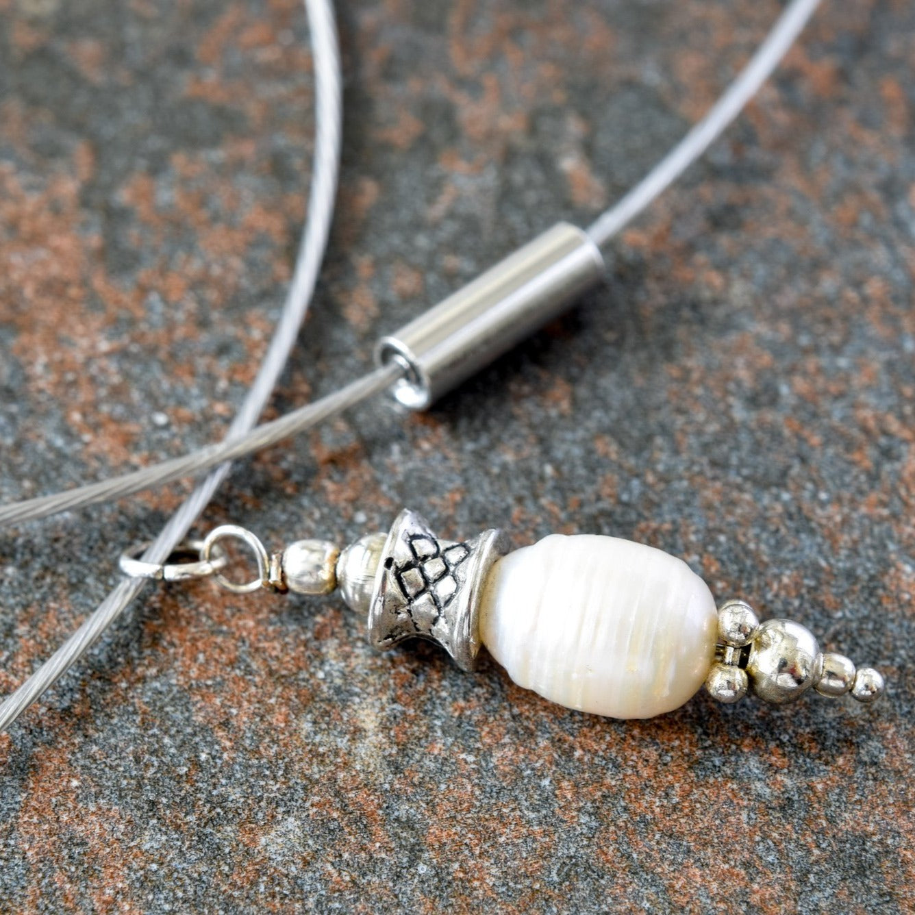 Simplicity, White Fresh Water Pearl Pendent on a Stainless-Steel Slide Necklace