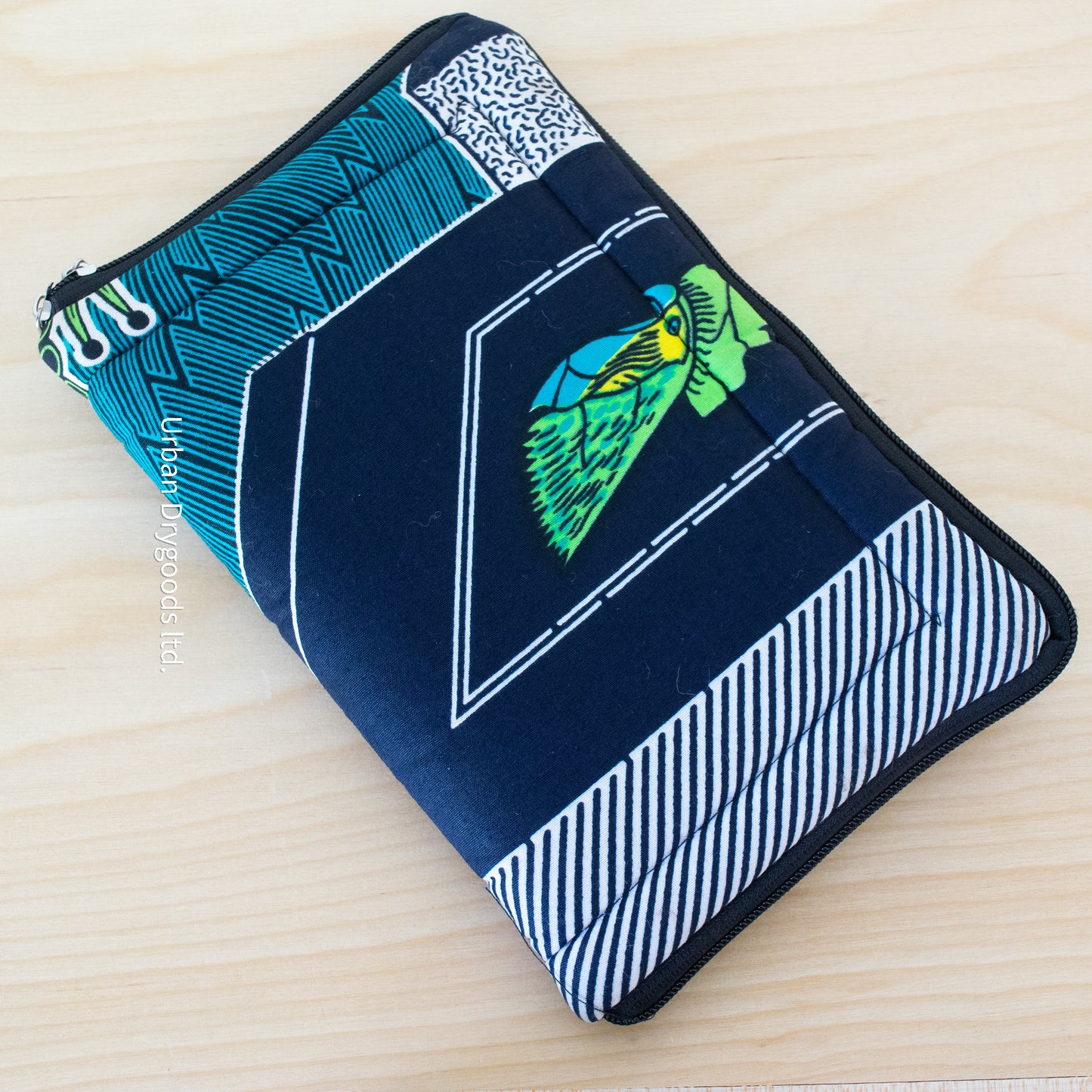 African, Handmade Padded Pouch for Small Tablet Computers. Blue, and Green with a Stylized Green Cockatiel