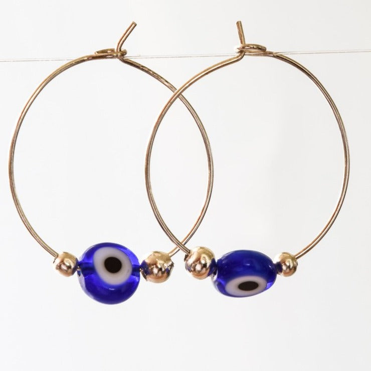 Little Treats, Silver Hoop Earrings with Blue Glass Evil Eye