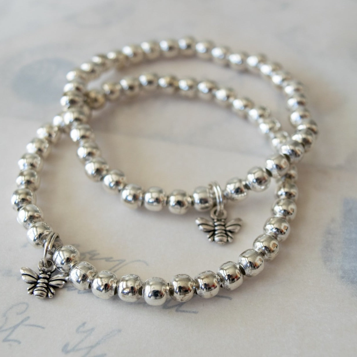 Stackables Stretch Bracelet with Large, Silver 5mm Beads and a Tibetan Silver Bumble Bee