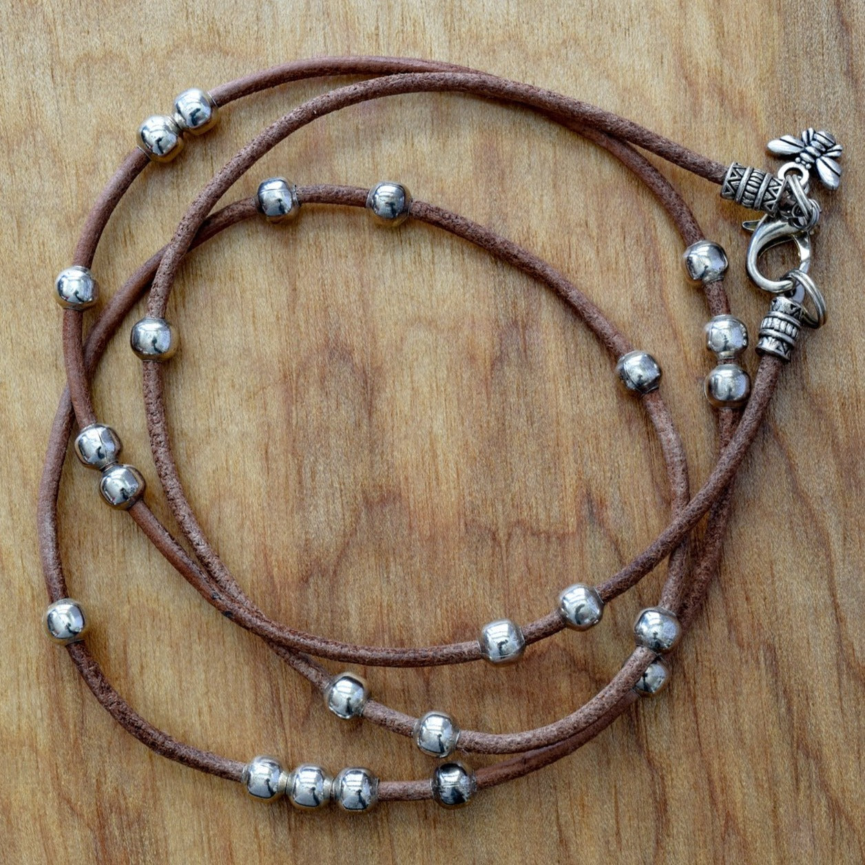 Beginnings,  Leather Necklace or Wrap Bracelet with Silver Beads