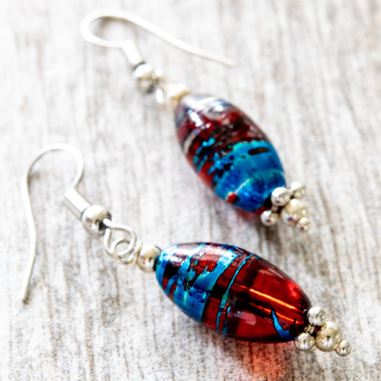 Little Treats, Fishhook Dangle Earrings with Ruby, Gold, Blue, and Silver Swirls