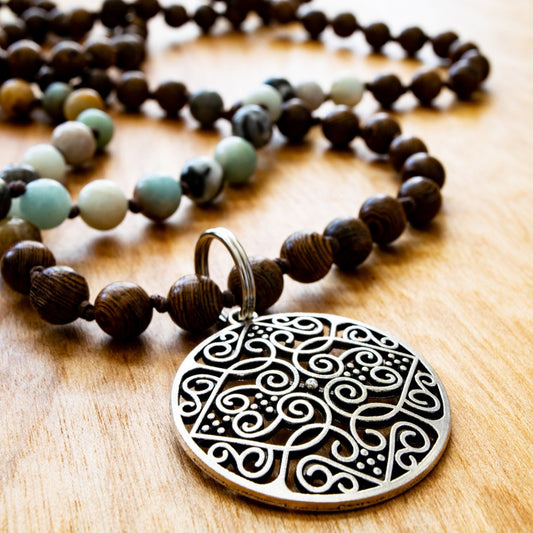 Beginnings, Natural Amazonite and Wooden Beaded Necklaces with a Silver Pendant