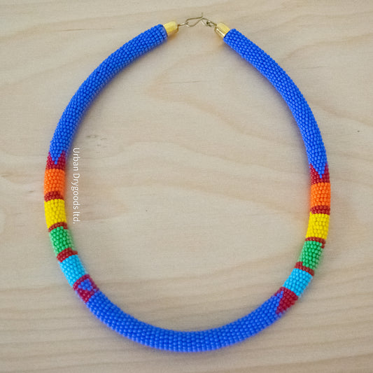 Zulu and Messiah African Handmade Beaded Necklace Periwinkle with Red, Orange, Yellow, Green, and Sky Blue