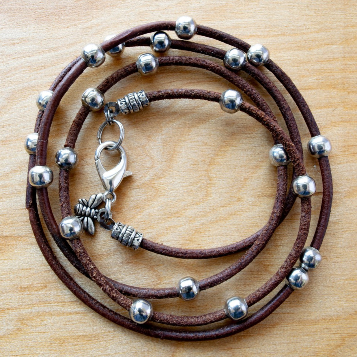 Beginnings,  Leather Necklace or Wrap Bracelet with Silver Beads