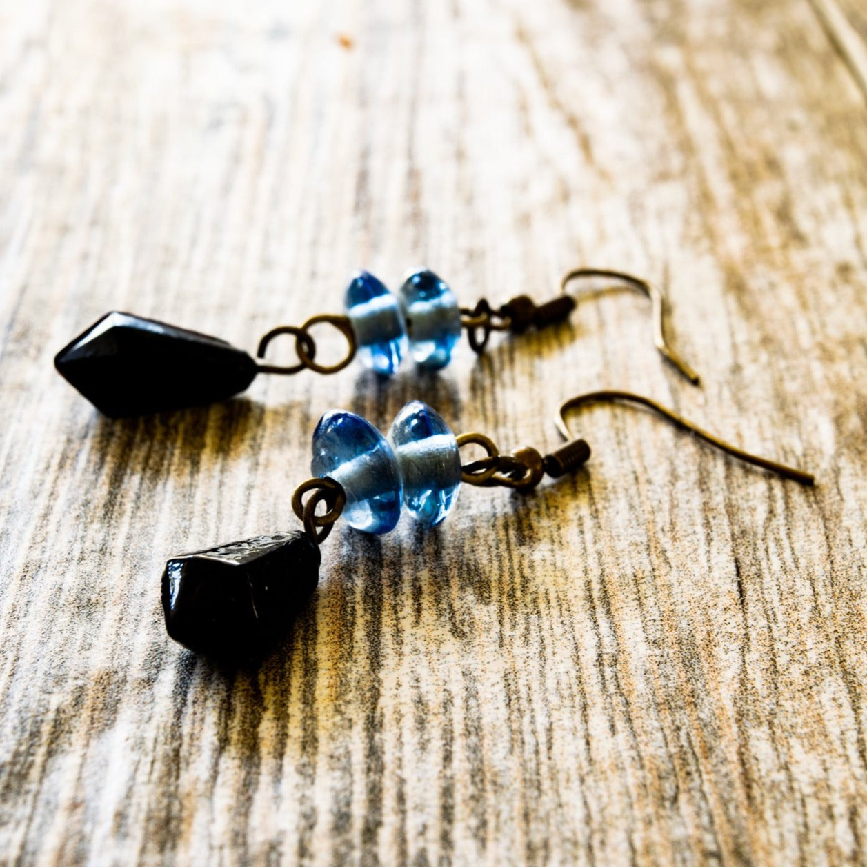 Fringe, Aged Brass Dangle Earrings with Handmade Light Blue and Jet Black Glass Beads