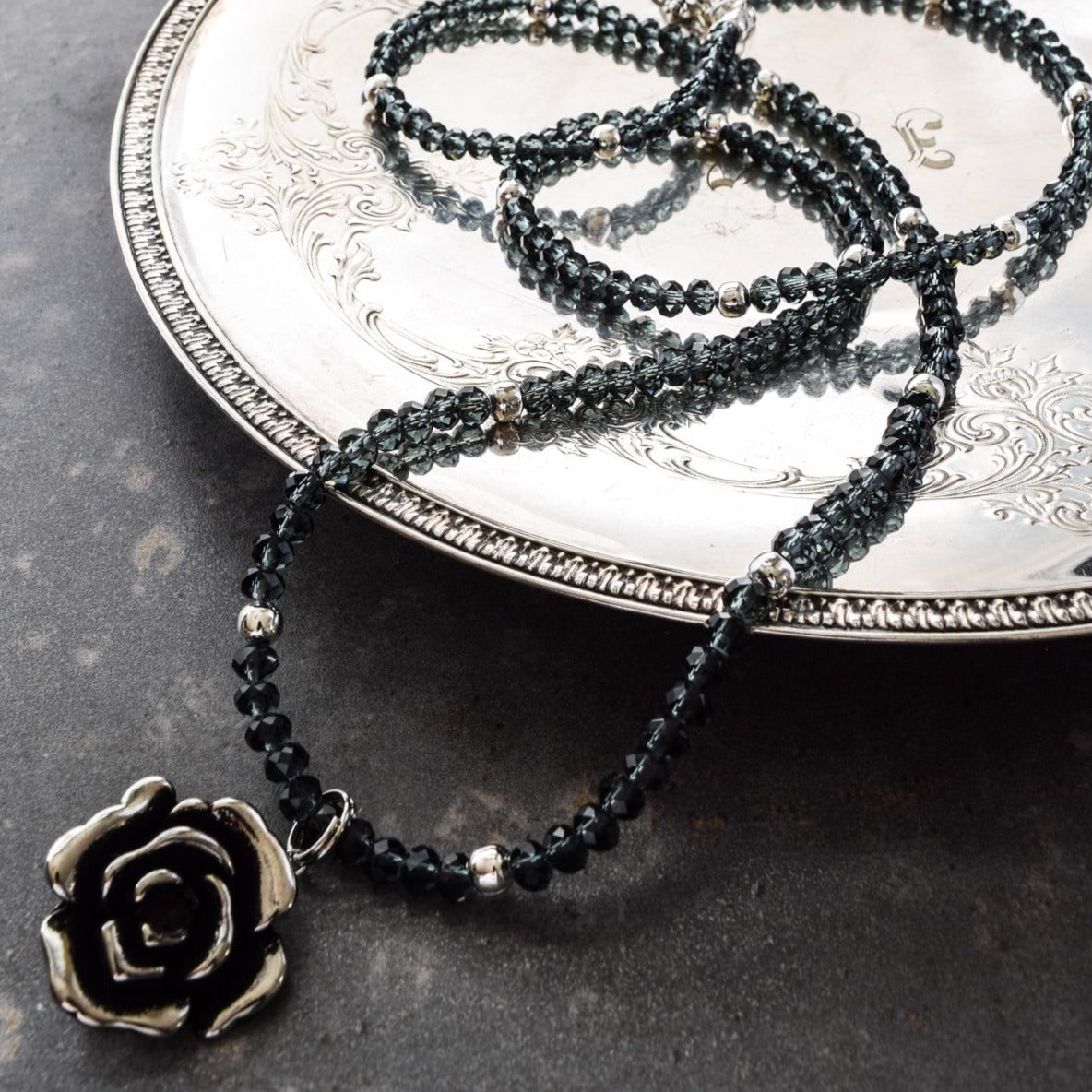 Expressions in Jewels, Necklace with Faceted Prussian Blue Crystals and a Silver Rose Pendant