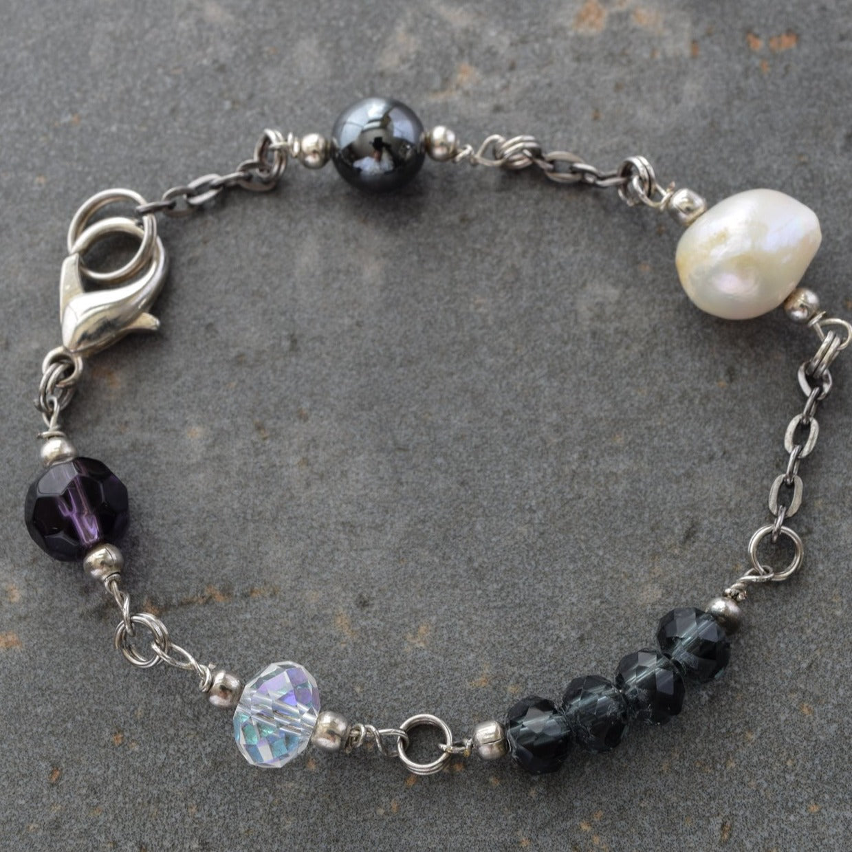 Expressions in Jewels, Bracelet with Gunmetal Chain and links of Faceted Persian Blue, Electroplated Crystals, Hematite, and Fresh-Water Pearls