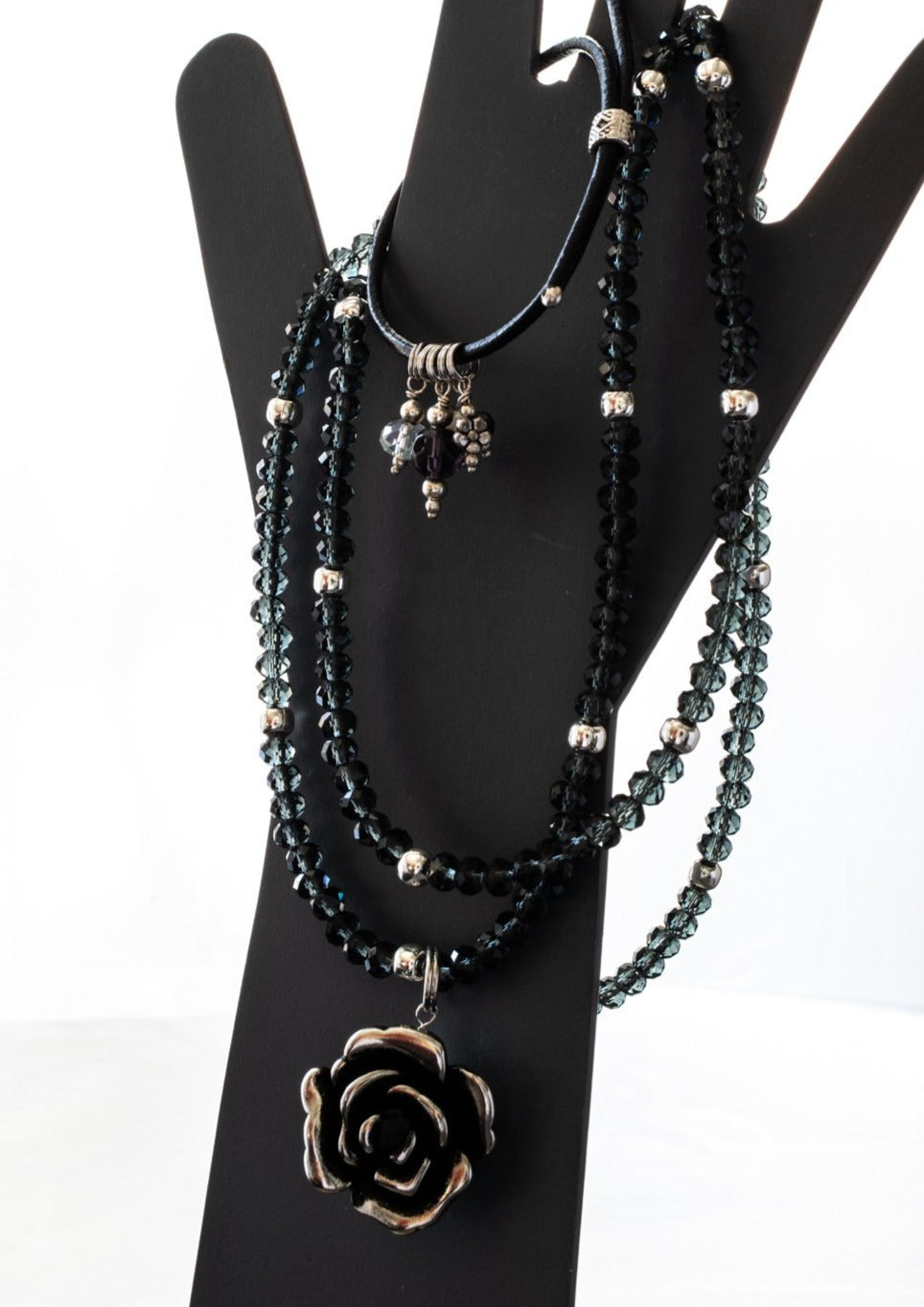 Expressions in Jewels, Necklace with Faceted Prussian Blue Crystals and a Silver Rose Pendant