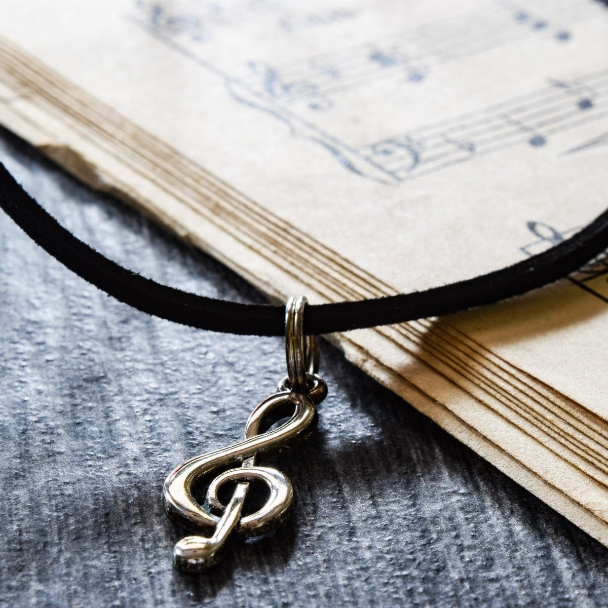 Little Treats, Faux Leather Cord Necklace with a Silver Treble Clef Pendant