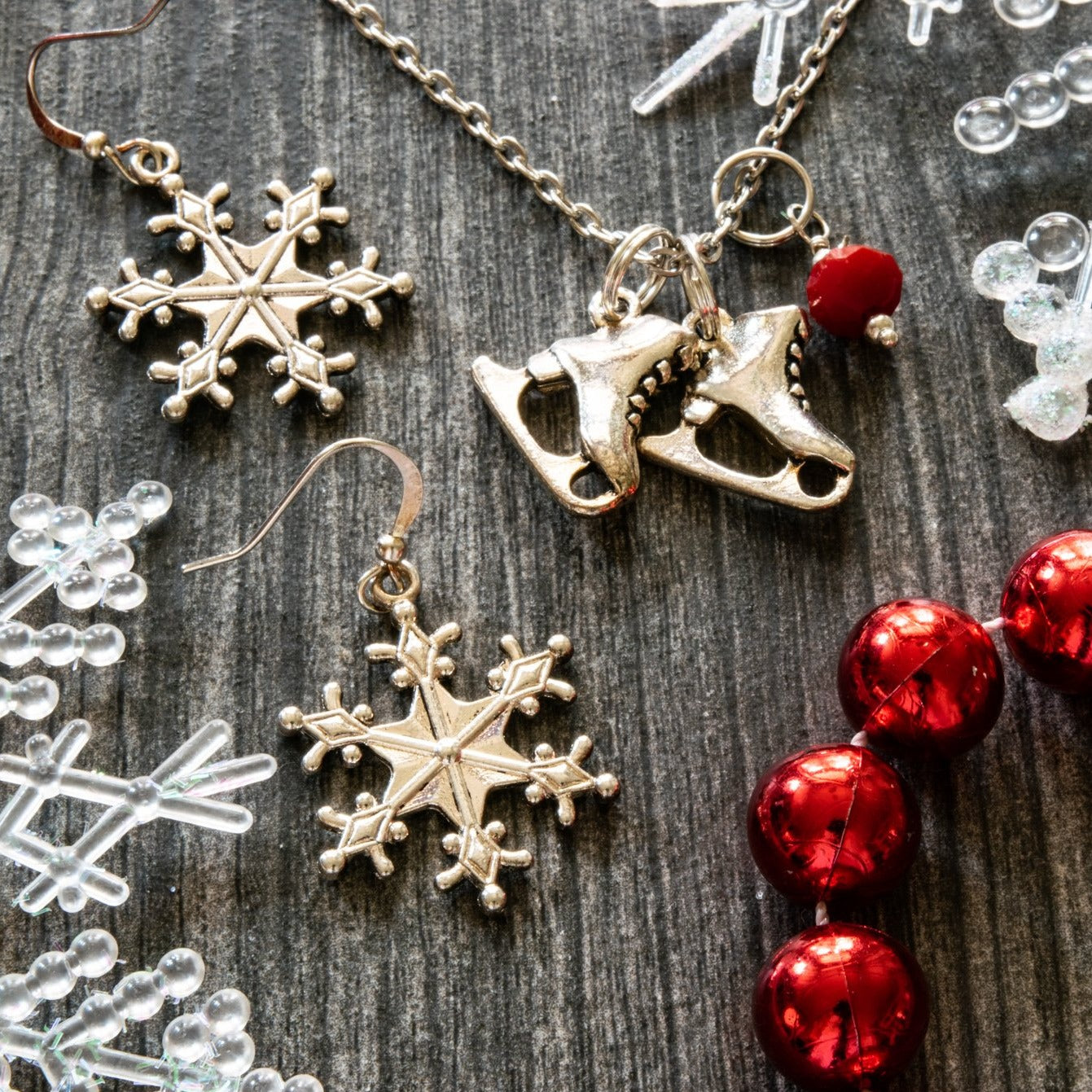 Holidays, Let it snow - Stainless Steel Necklace with Ice Skates, Faceted Red Glass Bead, and Bumblebee