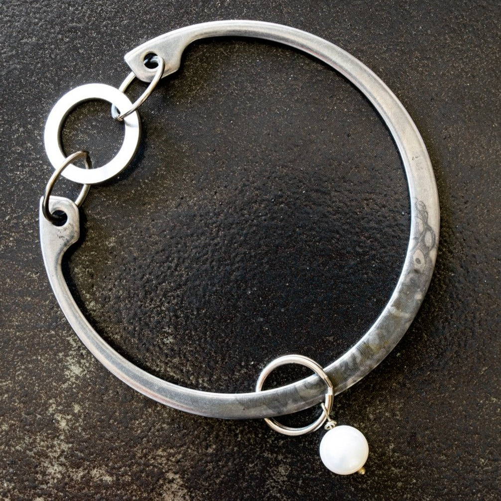 Impressions, Industrial Steel Bracelet with a White Pearl Bangle