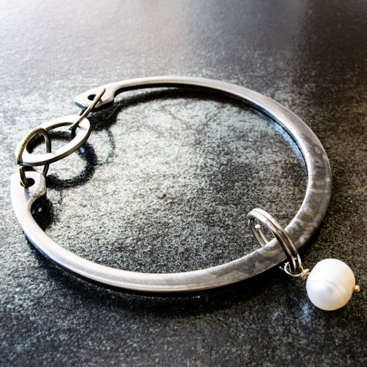 Impressions, Industrial Steel Bracelet with a White Pearl Bangle