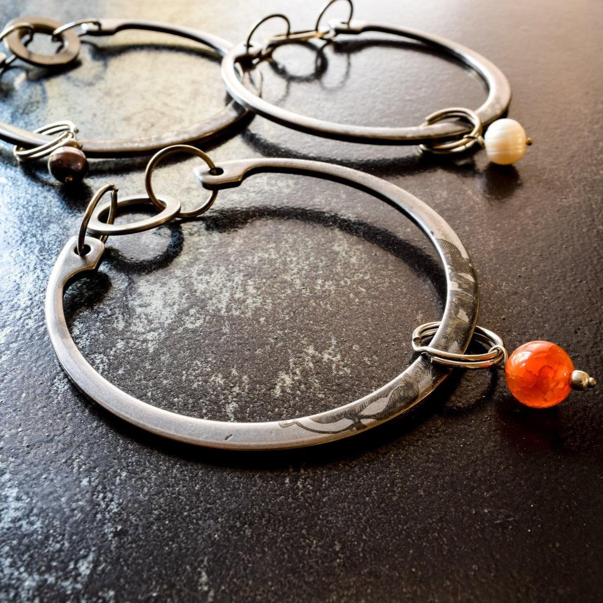 Impressions, Industrial Steel Bracelet with a Cinnamon Agate Bangle