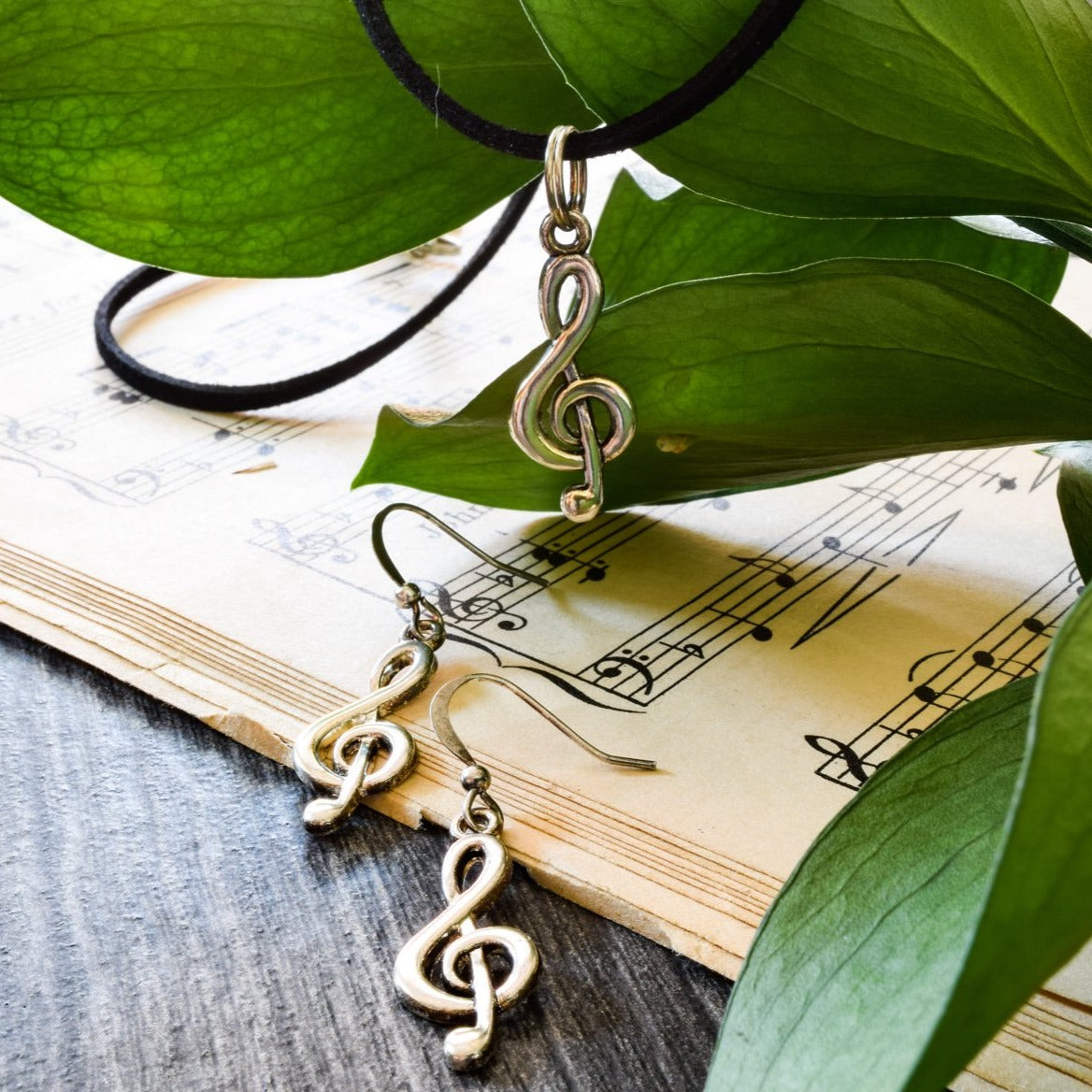 Little Treats, Faux Leather Cord Necklace with a Silver Treble Clef Pendant