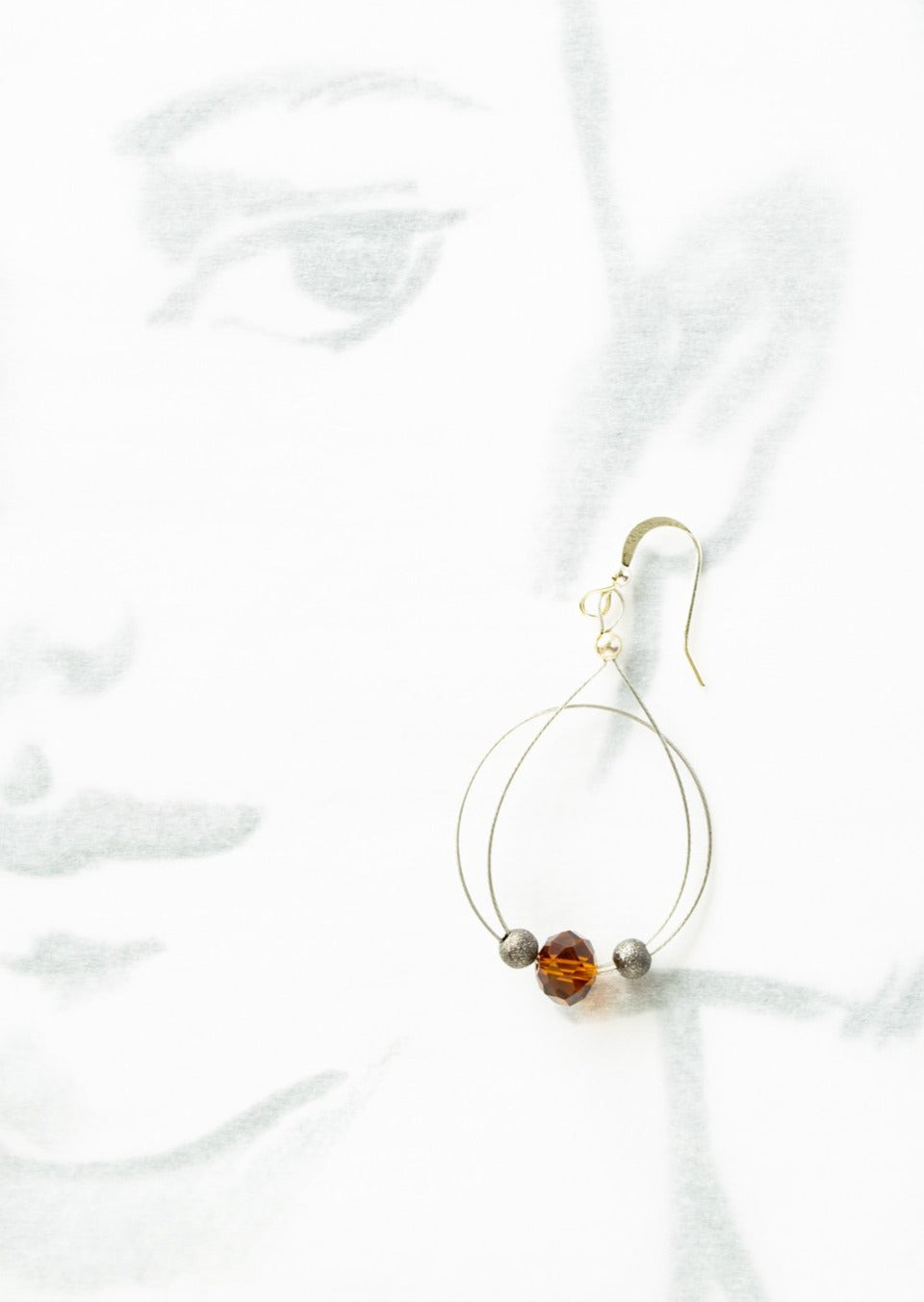 Basics, Loop-de-Loop Dangle Earrings with an Amber Crystal