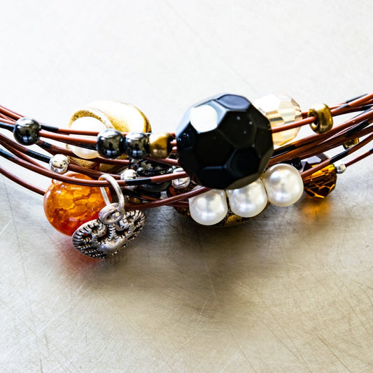 Strands, Brown with Black Wire Necklace with Glass, Stone, and Metallic Beads, and a Heart Charm