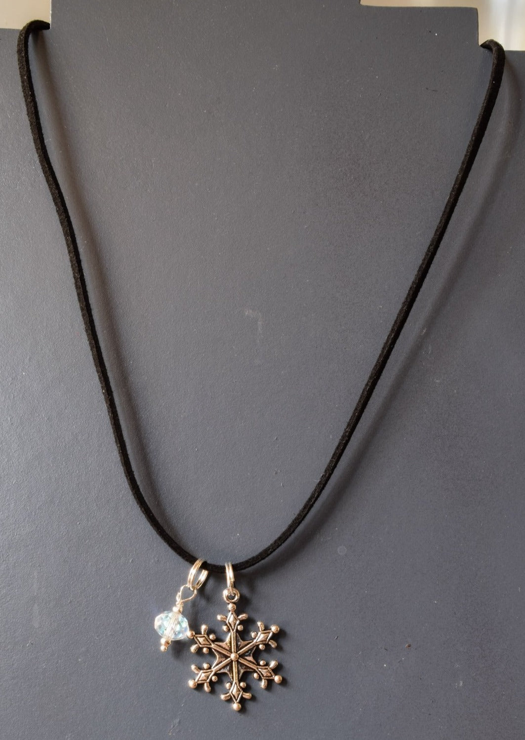 Holidays, Let It Snow - Faux Leather Necklace with a Silver Snowflake, Crystal, and Bumblebee