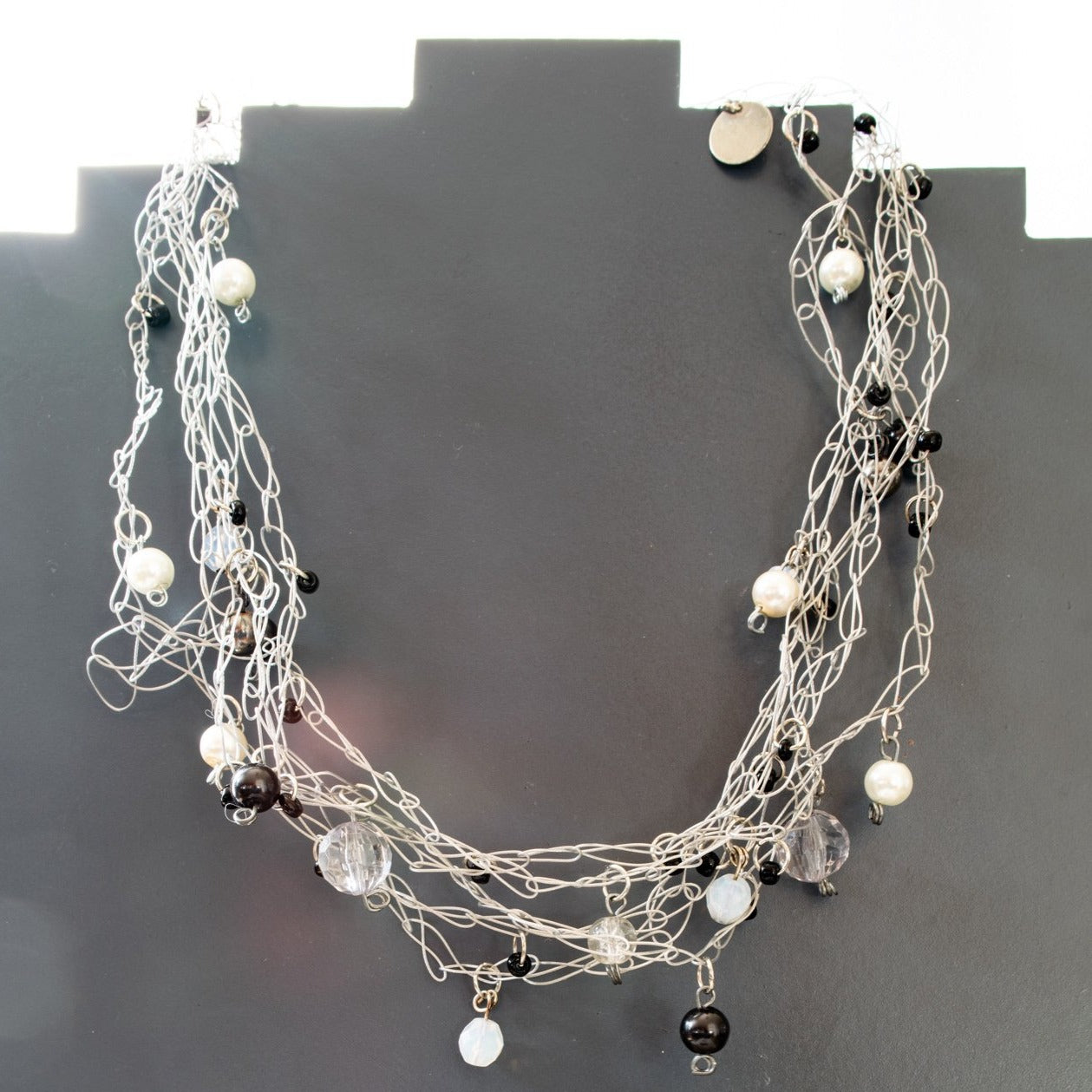 Soft Rain, Woven Wire Necklace with numerous and varied Beads