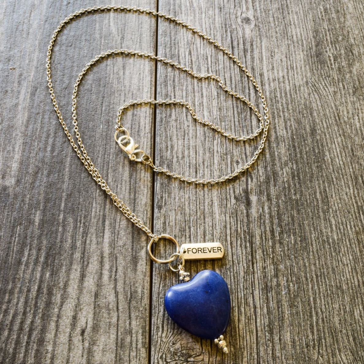 Simplicity, Stainless Steel Pendant Necklace with a Blue Stone Heart Pendant and Forever Charm