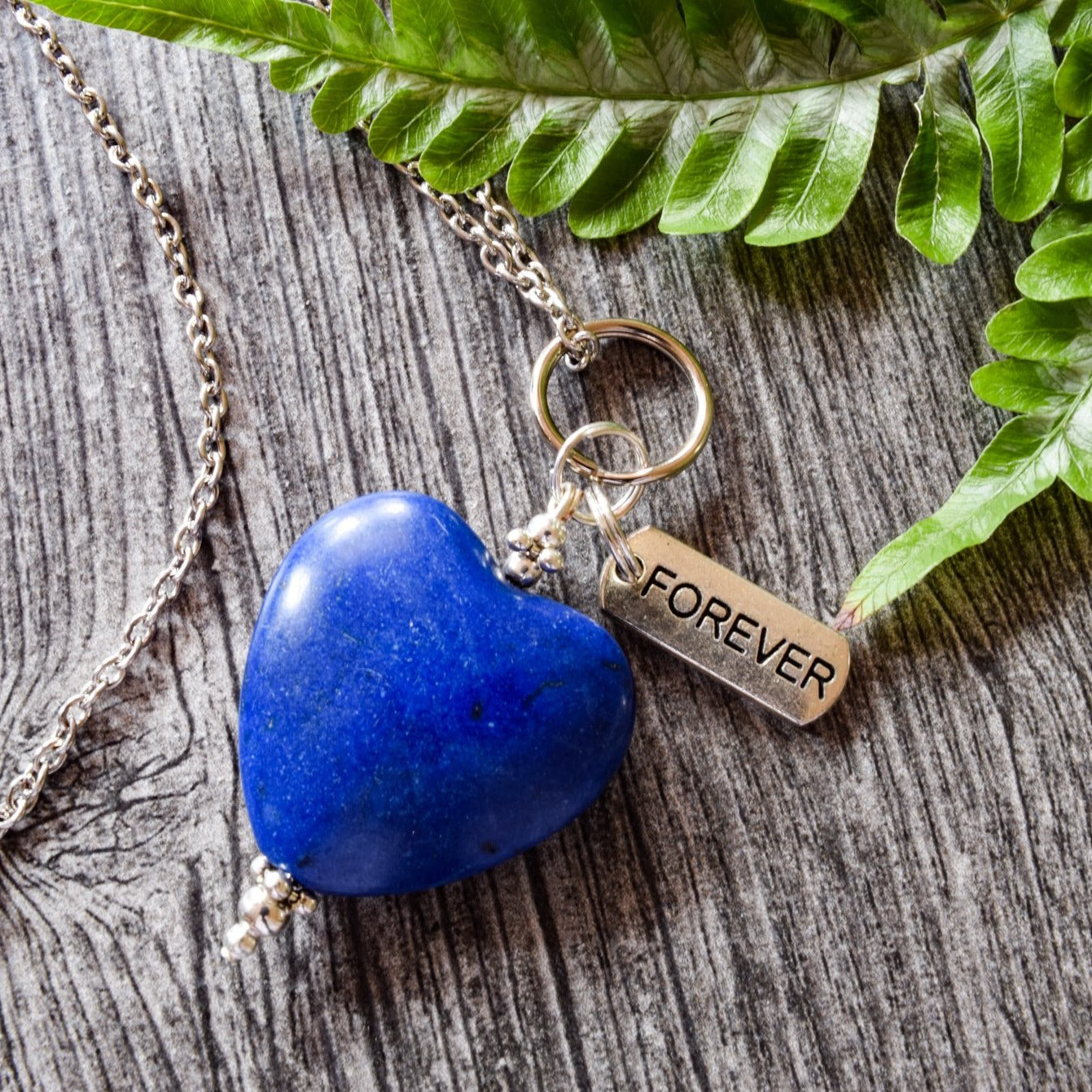 Simplicity, Stainless Steel Pendant Necklace with a Blue Stone Heart Pendant and Forever Charm