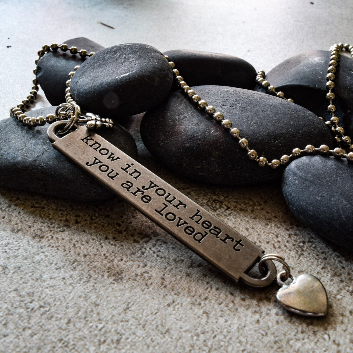 Words to inspire, Ball Chain Necklace with Tag Engraved with "Know in your heart your are loved"