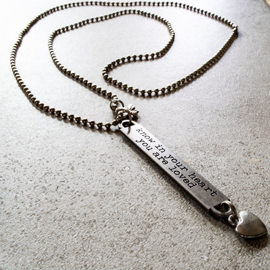 Words to inspire, Ball Chain Necklace with Tag Engraved with "Know in your heart your are loved"