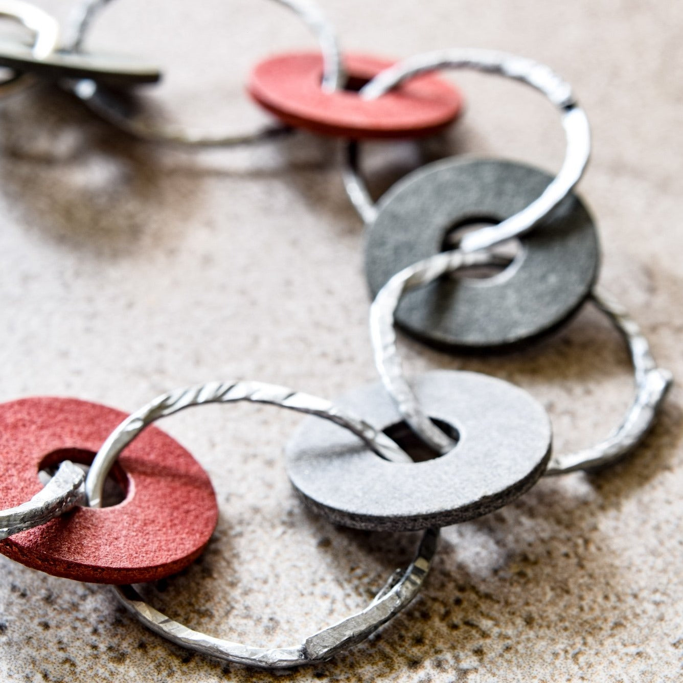 Rings, Hammered Steel Bracelet with Red and Black Fibre Washers