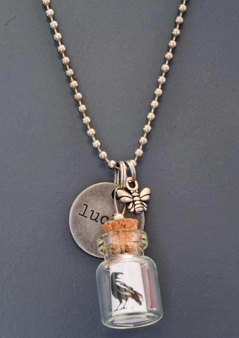 Little Messages, Ball Chain Necklace with ''Black Bird'' Small Glass Bottle Pendent and "Lucky" Tag Charm