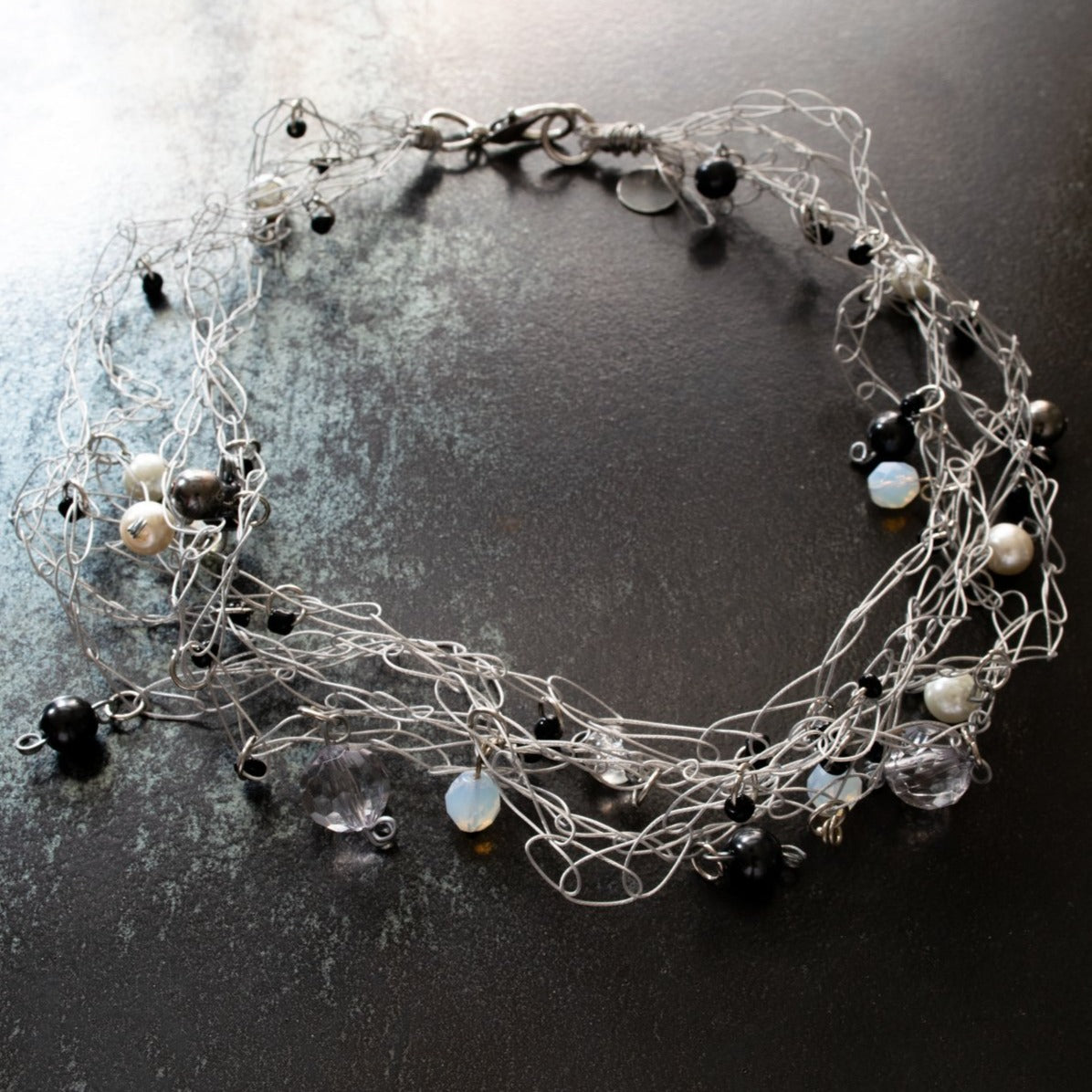 Soft Rain, Woven Wire Necklace with numerous and varied Beads