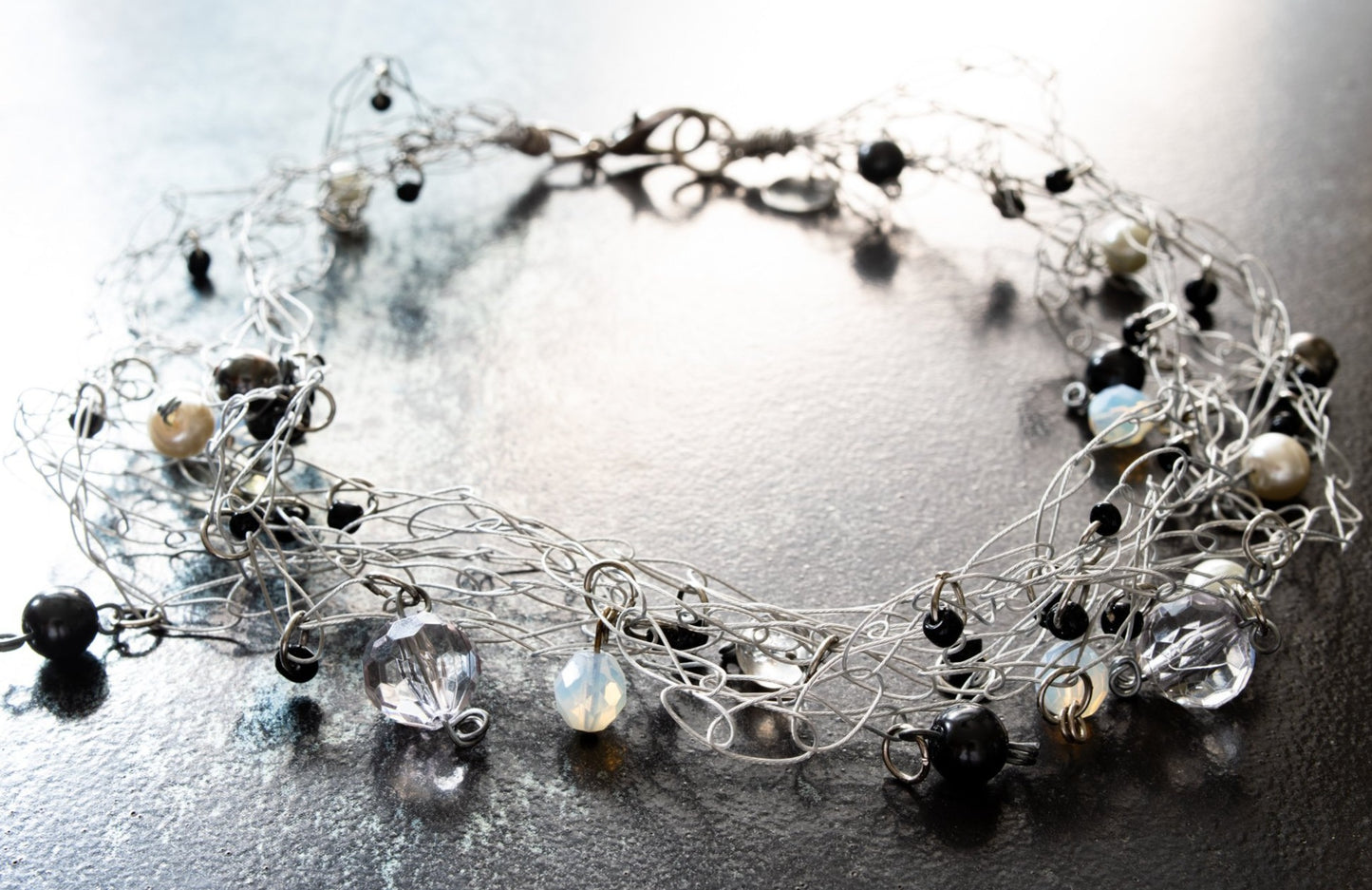 Soft Rain, Woven Wire Necklace with numerous and varied Beads