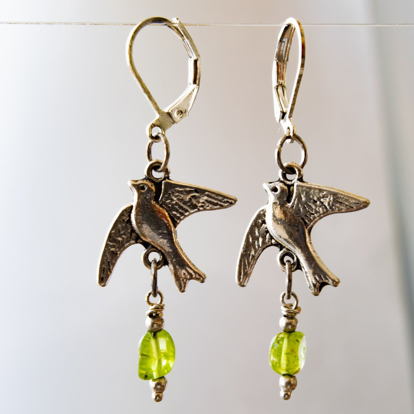 Expression’s Birds in Flight Dangle Earrings with Opalite and Peridot gemstones