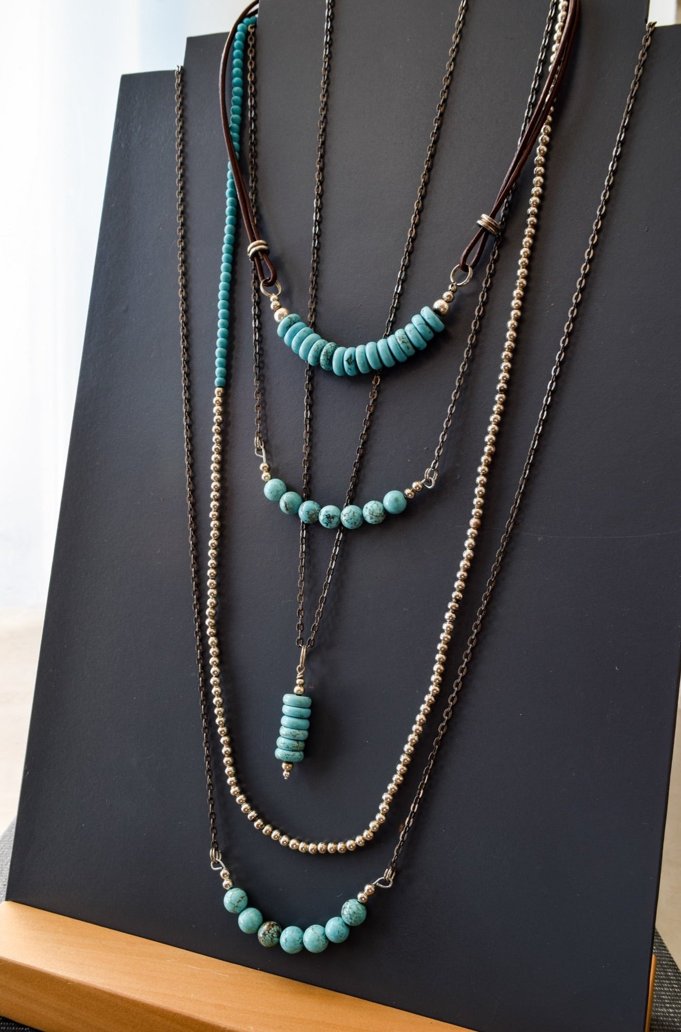 Expressions in Turquoise, 19 inch Stacked Turquoise Pendent on a Gunmetal Necklace