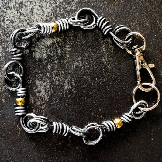 Marty's Twisted, Bracelets with Gold Plated Hematite Beads and Steel Links